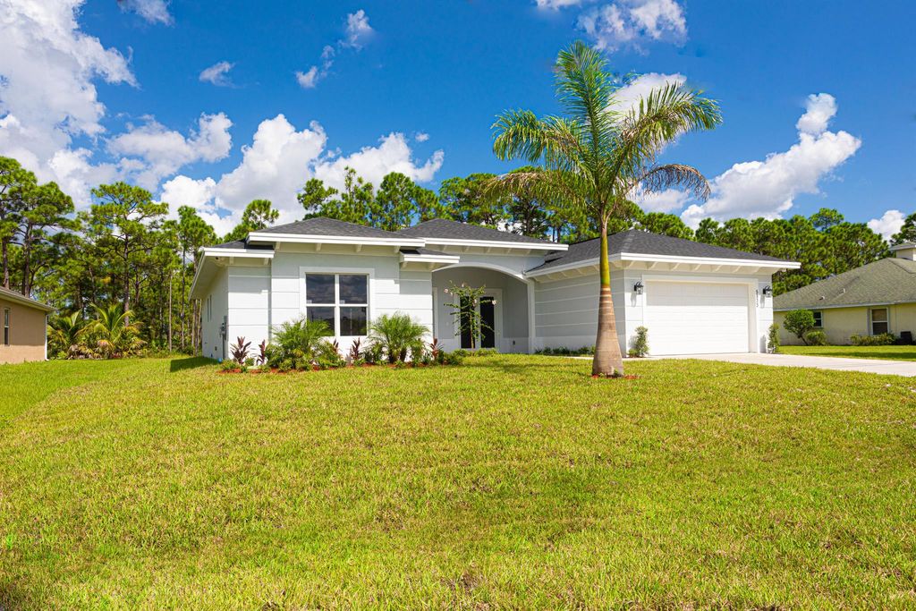 Photo of 5833 NW Wesley Road, Port Saint Lucie, FL 34986 (MLS # R10926284)