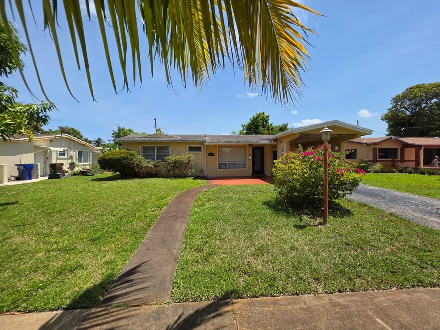 COME MAKE THIS SPACIOUS 2 BEDROOMS 2 BATHROOMS SINGLE FAMILY HOUSE WITH A 1 CAR CARPORT HOME.. UPDATED KITCHEN WITH GRANITE COUNTER TOPS, STAINLESS STEEL APPLIANCES. TILE FLOORS THROUGHOUT. LARGE BACKYARD WITH ROOM FOR FAMILY GATHERING. WALKING DISTANCE TO TONS OF SHOPPING AREAS. CLOSE TO MAJOR MALLS, HIGHWAYS AND THE BEACHES ETC. NO HOA!!!