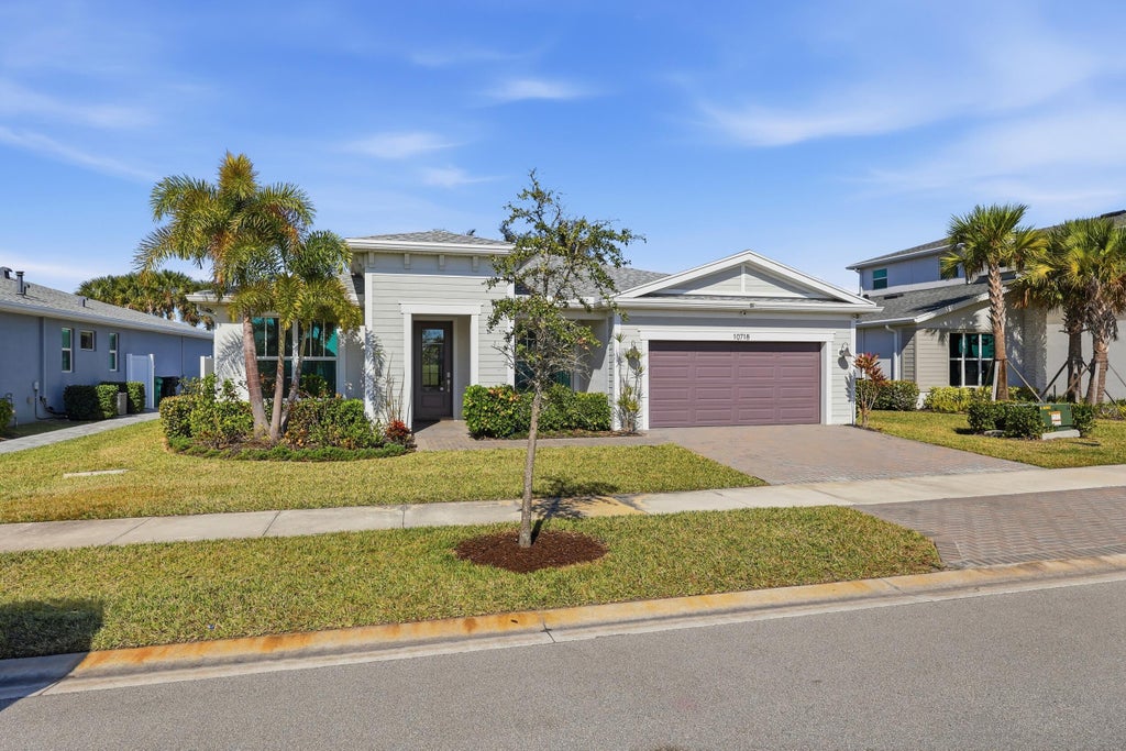 Photo of 10718 SW Hensley Street, Port Saint Lucie, FL 34987 (MLS # R11159582)