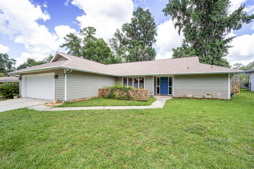 Just minutes from the World Equestrian Center, this charming and beautifully maintained 3-bedroom, 2-bath home located in the desirable NW Ocala area, just minutes from the World Equestrian Center, shopping, dining, and major highways. This warm and inviting residence offers a comfortable 1,776 sq ft of living space and sits on a generous, fully fenced lot.Step inside to an open and airy floorplan featuring vaulted ceilings, a cozy fireplace, and a spacious living and dining area perfect for everyday living or entertaining. The updated kitchen includes solid wood cabinetry, stone-style countertops, and an eat-in breakfast area with plenty of natural light.The primary suite is privately tucked away and offers a walk-in closet and an en-suite bathroom. Two additional