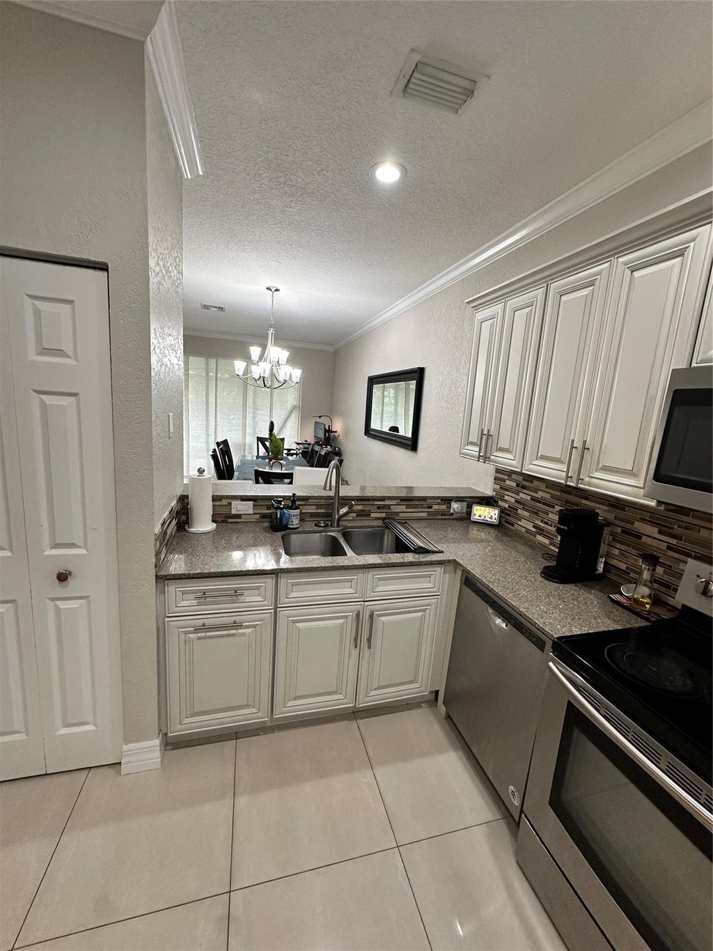 Photo of 10060 Boca Palm Drive, Boca Raton, FL 33498 (MLS # F10478595)