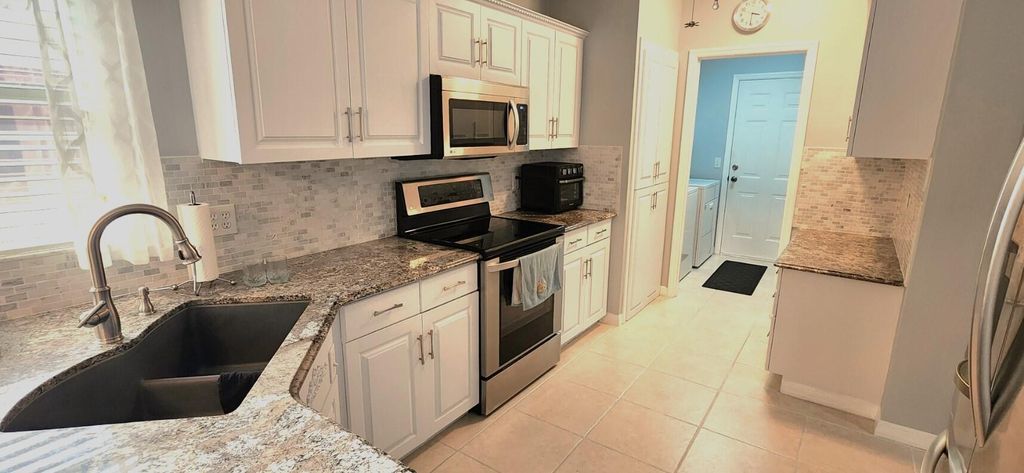 Photo of 6229 Alexandria Circle, Fort Pierce, FL 34982 (MLS # R10975934)