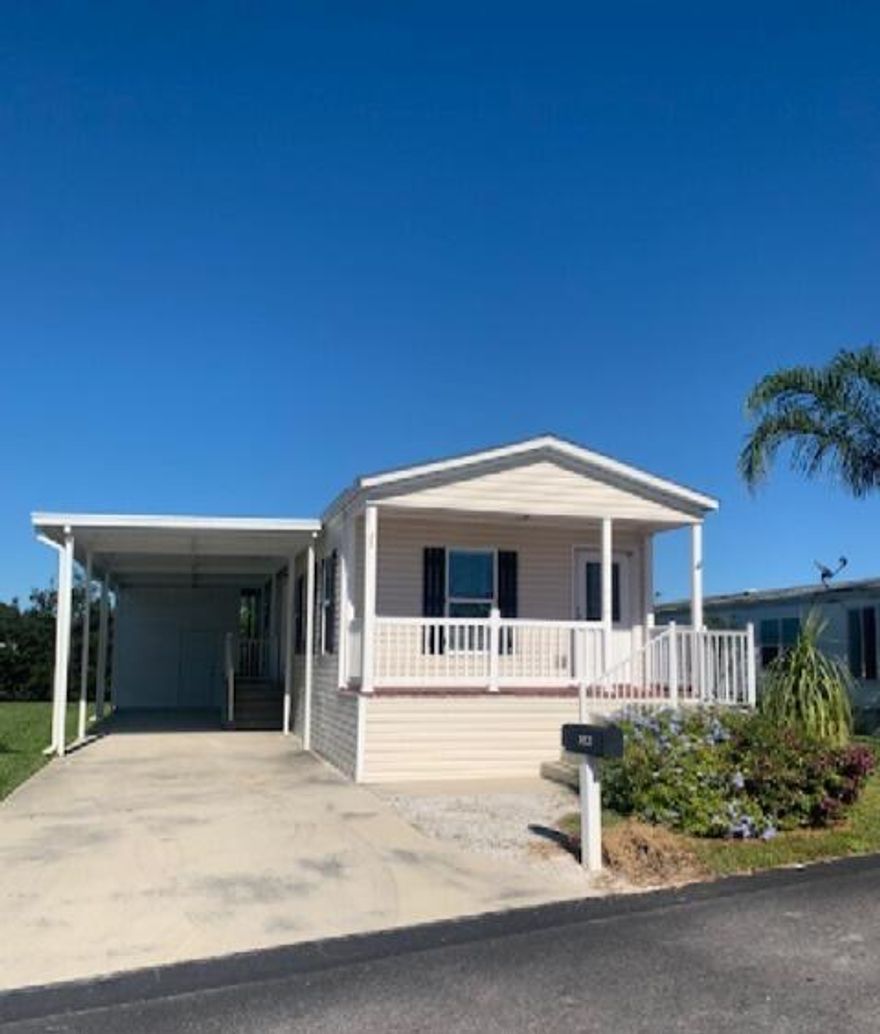 LOT LEASE $775. Charming 2019 manufactured home in Sandhill Shores (55+ community) featuring 2 beds, 1 bath, laminate flooring throughout with chair rail and crown moldings. Located in a +55 plus community with a land lease $775 that includes lawn care, sewer/water and access to community amenities like a pool, fitness center, billiards, and clubhouse. Call for a showing today!