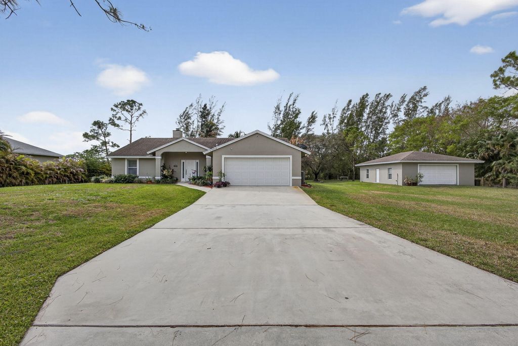 Photo of 13714 78th Place N, West Palm Beach, FL 33412 (MLS # B26000943)