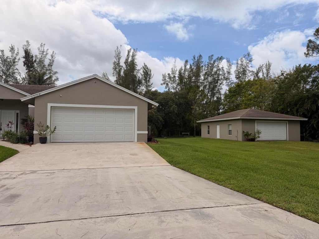 Photo of 13714 78th Place N, West Palm Beach, FL 33412 (MLS # B26000943)