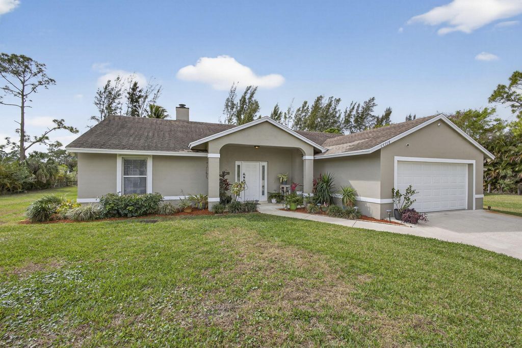 Photo of 13714 78th Place N, West Palm Beach, FL 33412 (MLS # B26000943)