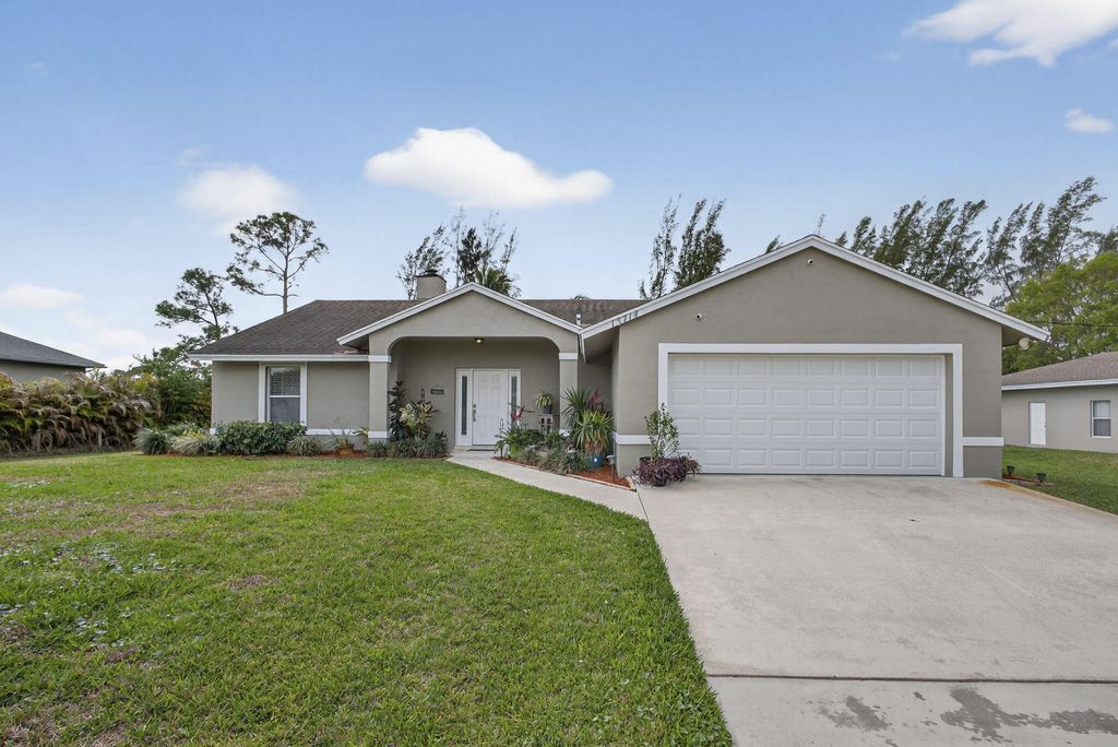 Photo of 13714 78th Place N, West Palm Beach, FL 33412 (MLS # B26000943)