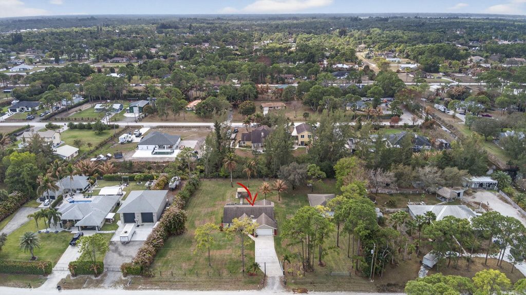 Photo of 13714 78th Place N, West Palm Beach, FL 33412 (MLS # B26000943)