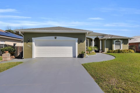 Photo of 1885 SW ALTMAN Avenue, Port Saint Lucie, FL 34953 (MLS # B26081123)