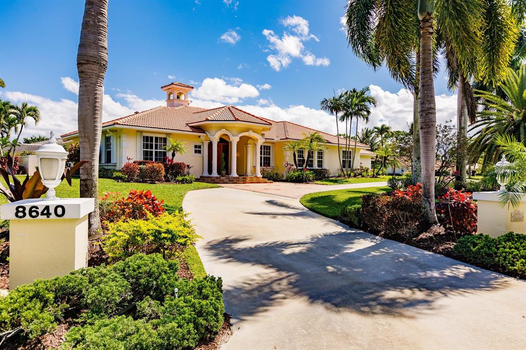 This Estate home is located in the highly sought after and safe community of Steeplechase that has manned gates at the south and west entrances, and security patrolling the neighborhood at all times. This is a meticulously maintained, custom built property, situated on a sprawling acres lot. When you first walk in through the French double doors, you will be introduced to vaulted and multi-tiered tray ceilings, luxurious crown moldings all around, and a resort style pool with a tranquil built-in rock waterfall, and a large covered patio deck with a built-in grill that could be perfect for family gatherings or an ample space for entertainment and relaxation.