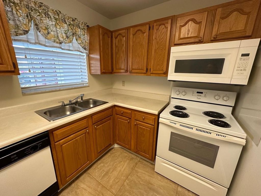 Photo of 303 Lake Dora Drive, West Palm Beach, FL 33411 (MLS # F10438800)