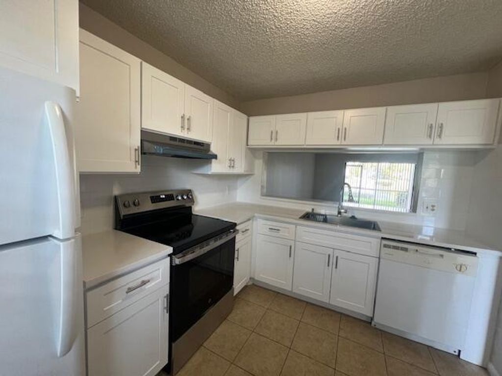 Photo of 22017 Palms Way #104, Boca Raton, FL 33433 (MLS # B26019335)