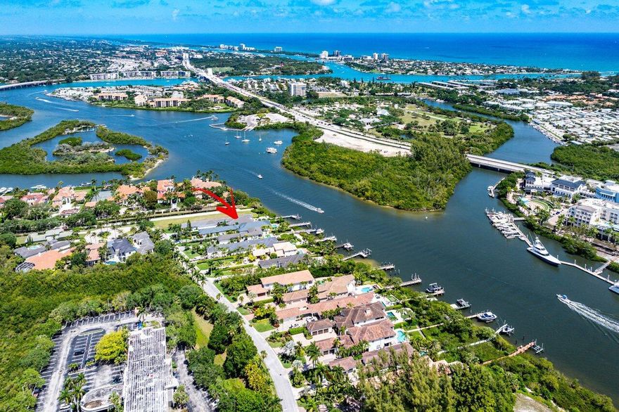 DIRECT INTRACOASTAL-BEST LOCATION IN JUPITER- this is a one of a kind fully renovated luxury estate featuring a 3 bedroom 3.5 bathroom main house with a 1 bedroom, 1 bath guesthouse all with the convenience of ground floor living!  In addition this home has been upgraded with a 3 car air conditioned garage and Versa Lift System for storage convenience. From the beautifully manicured front entrance to a backyard perfectly suited to intracoastal entertaining, no expense has been spared in creating the ideal tropical oasis.  The luxury upgrades of this exquisite home need to be seen to be appreciated including a fully renovated kitchen with top of the line appliances, new metal roof, new AC system, new driveway, premium landscape lighting, whole house generator, new tankless water heater,