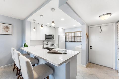 Photo of 3654 Via Poinciana #504, Lake Worth, FL 33467 (MLS # B26002633)