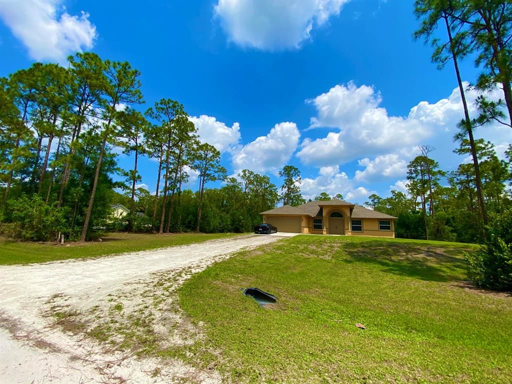 Photo of 17357 93rd Road N, Loxahatchee, FL 33470 (MLS # R10711107)