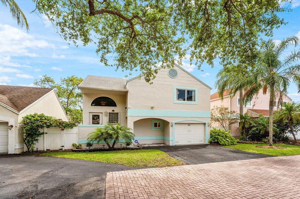 Photo of 331 NW 101st Terrace, Pembroke Pines, FL 33026 (MLS # B26017002)