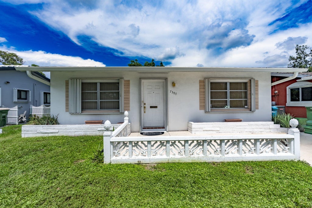Photo of 7307 NW 62ND Street, Tamarac, FL 33321 (MLS # B26077977)