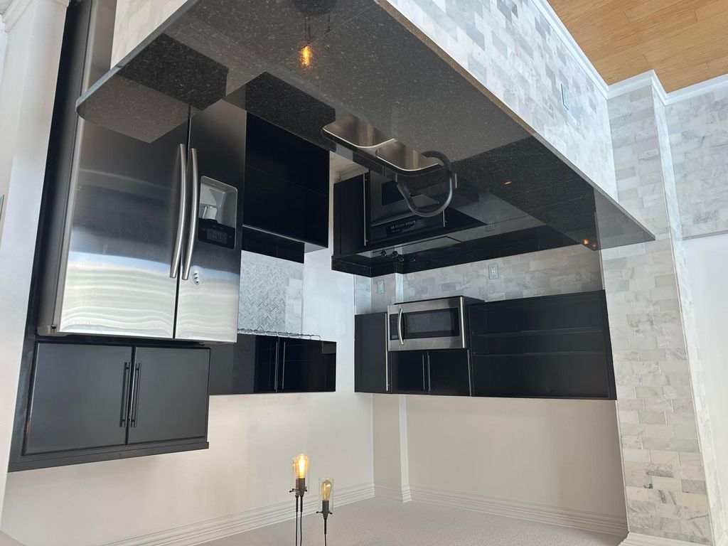 Photo of 1551 N Flagler Drive #Ph 9, West Palm Beach, FL 33401 (MLS # B26015146)