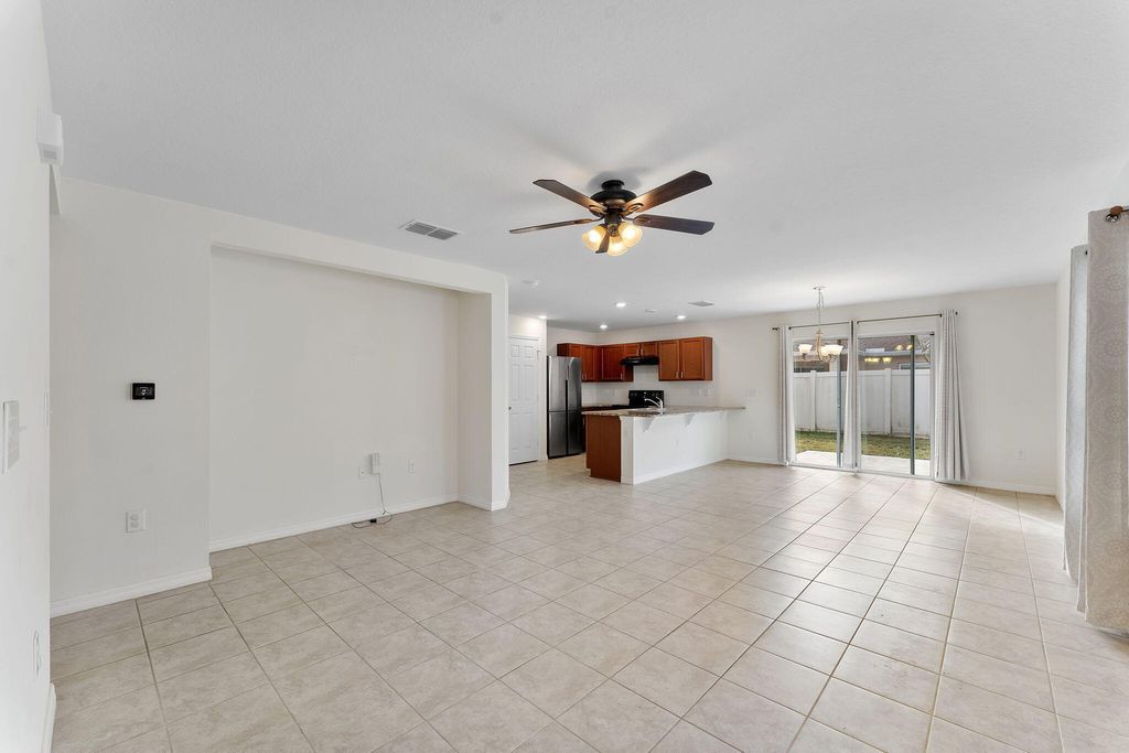 Photo of 5330 NW Pine Trail Circle, Port Saint Lucie, FL 34983 (MLS # B26013790)