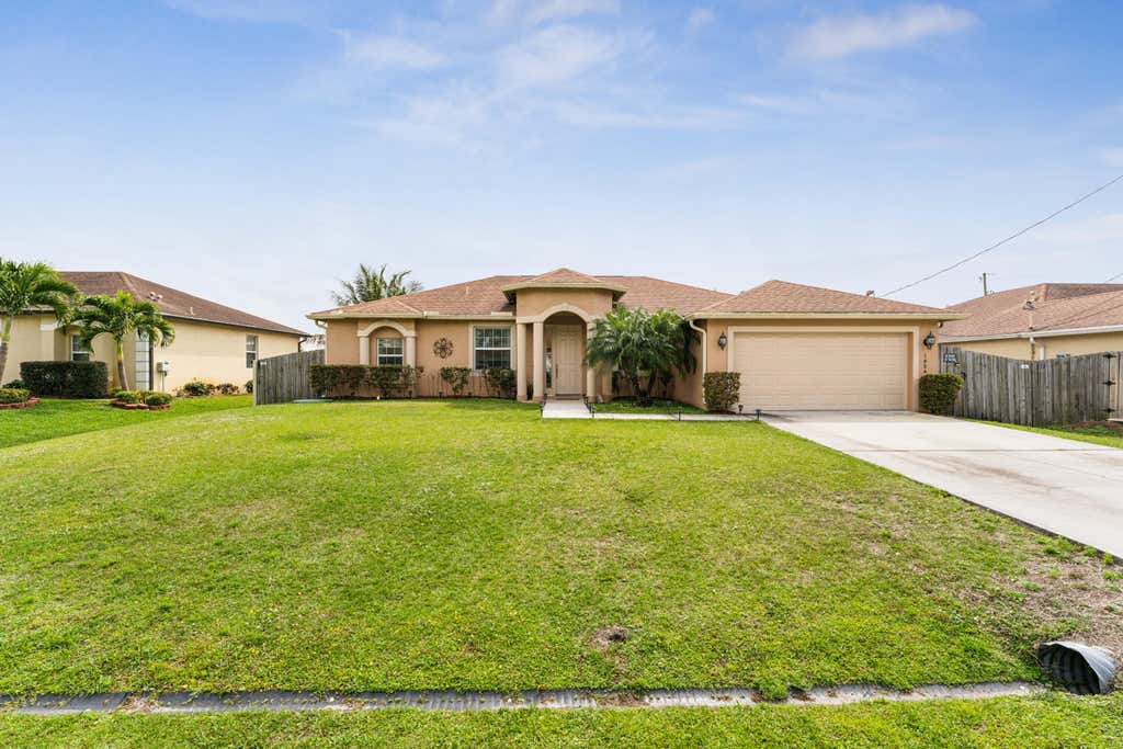 Photo of 1856 SW Fears Avenue, Port Saint Lucie, FL 34953 (MLS # R10967256)