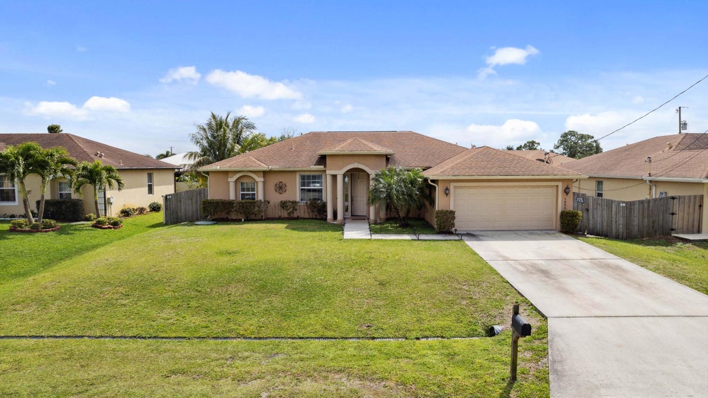 Photo of 1856 SW Fears Avenue, Port Saint Lucie, FL 34953 (MLS # R10967256)