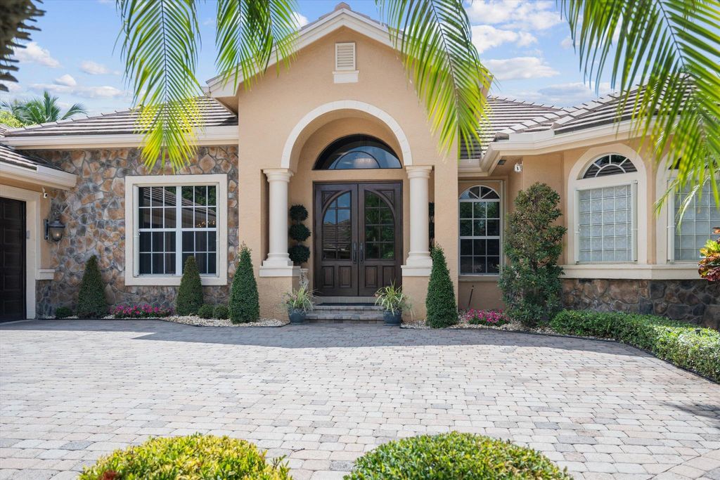Photo of 10758 Versailles Boulevard, Wellington, FL 33449 (MLS # R11093266)