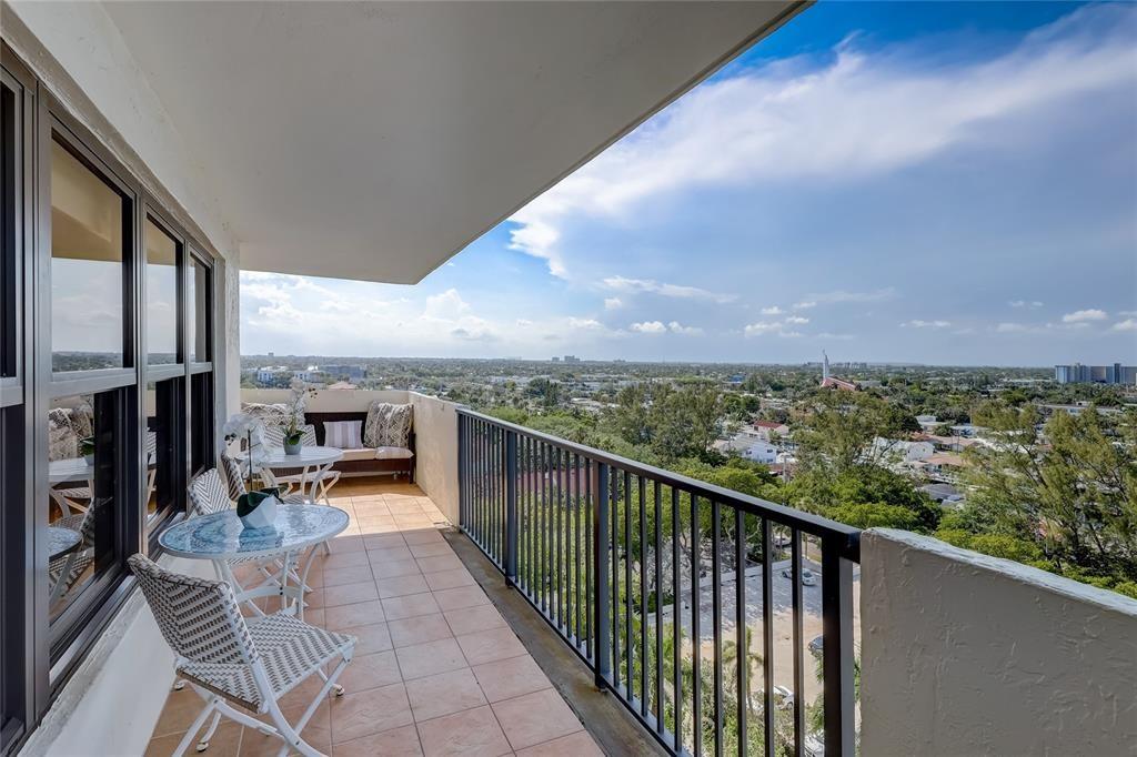 Coastal Living Made Easy!!! Move-In Ready and filled with natural light, this beautiful condo offers stunning North and West wrap around balcony views in a secure, guards gated community. Enjoy spacious master suite with walk-in closets, open kitchen with plenty of storage and in unity washer and dryer. Amenities include a heated pool, tennis courts, gym, marina, BBQ area, library, game room, and weekly social events. Just minutes from the beach and I-95! Internet/cable included impact windows. - Owner is living in unit and will need 30 days to start the lease.