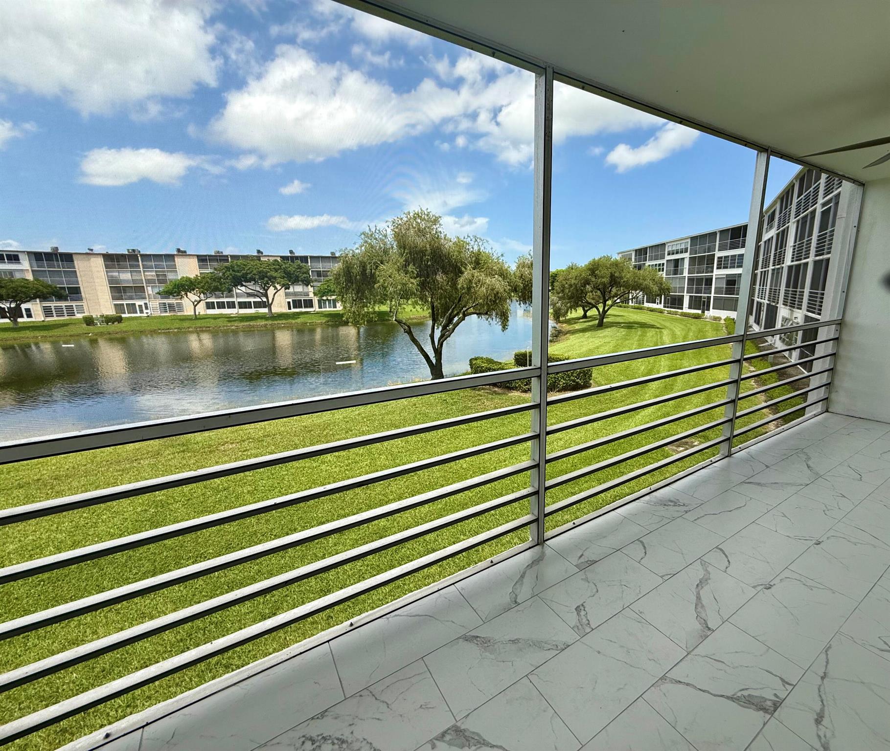 Recently renovated and professionally deep cleaned 2-bedroom 1.5 bath condo with expansive lake views. This unit is located in an elevator building on second floor in Guildford C of Century Village. Century Village is known for having one of the most active communities for people 55 years of age or older. Walking distance to Worship and many conveniences. WATER, CABLE AND WIFI INCLUDED by association. Good landlord and local handyman. Note: Unit comes with storage unit located behind the laundry facility located steps from unit. (No washer/dryer inside unit.) Looking for someone who wants to start lease asap.