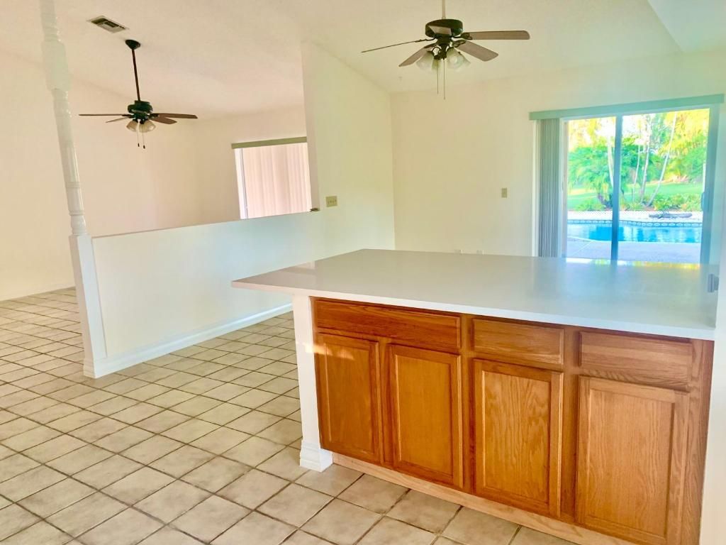 Photo of 107 Gibraltar Street, Royal Palm Beach, FL 33411 (MLS # R11151812)