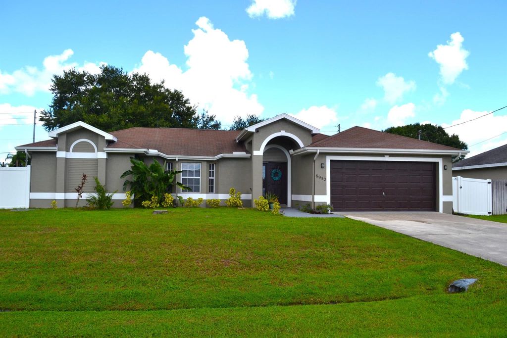 Photo of 6952 NW Daffodil Lane, Port Saint Lucie, FL 34983 (MLS # R11006755)
