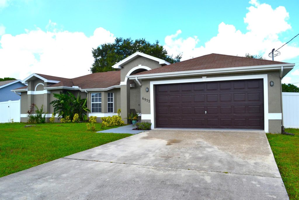 Photo of 6952 NW Daffodil Lane, Port Saint Lucie, FL 34983 (MLS # R11006755)