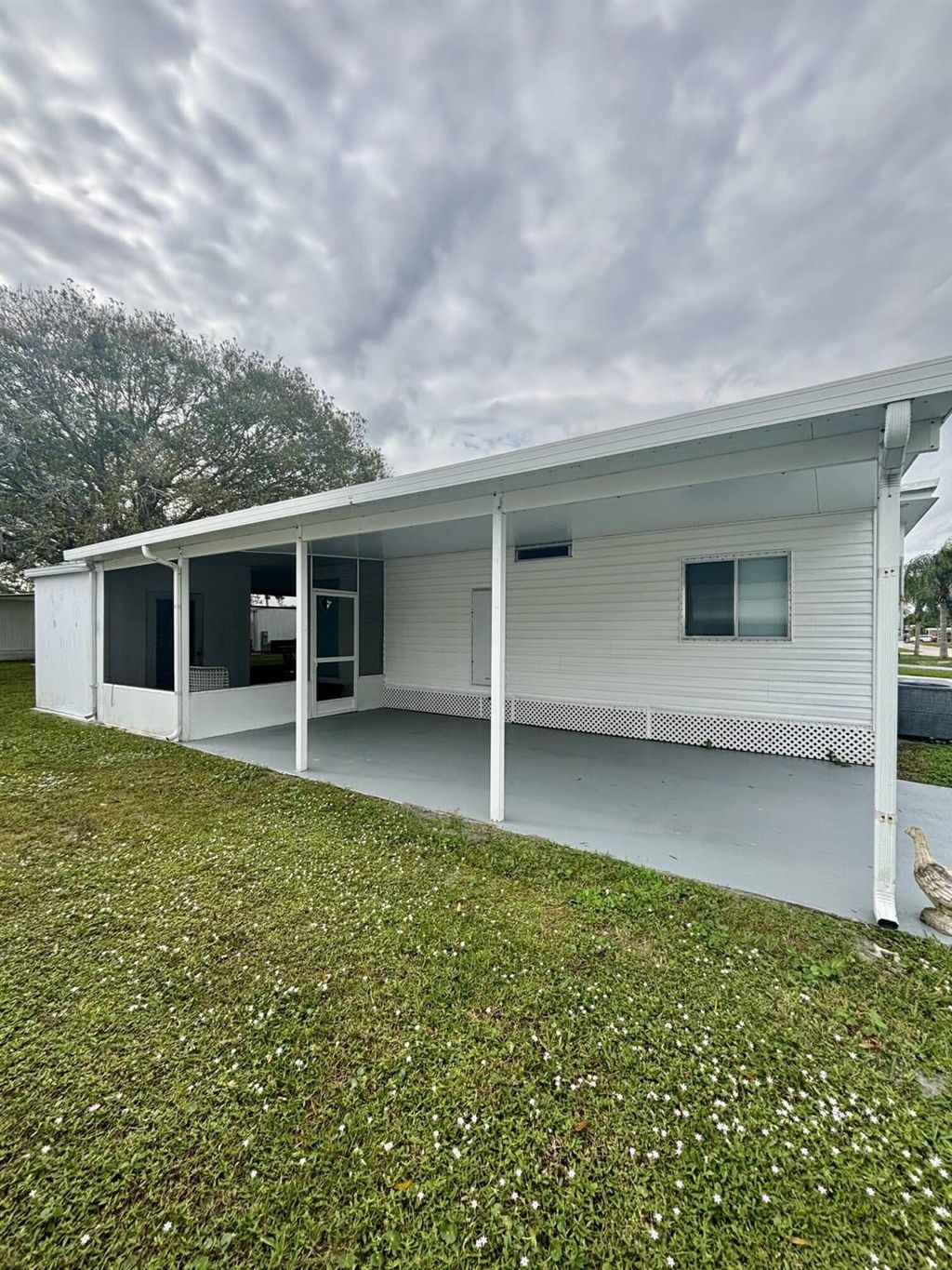 Photo of 46 Camino Del Rio, Port Saint Lucie, FL 34952 (MLS # R11145026)