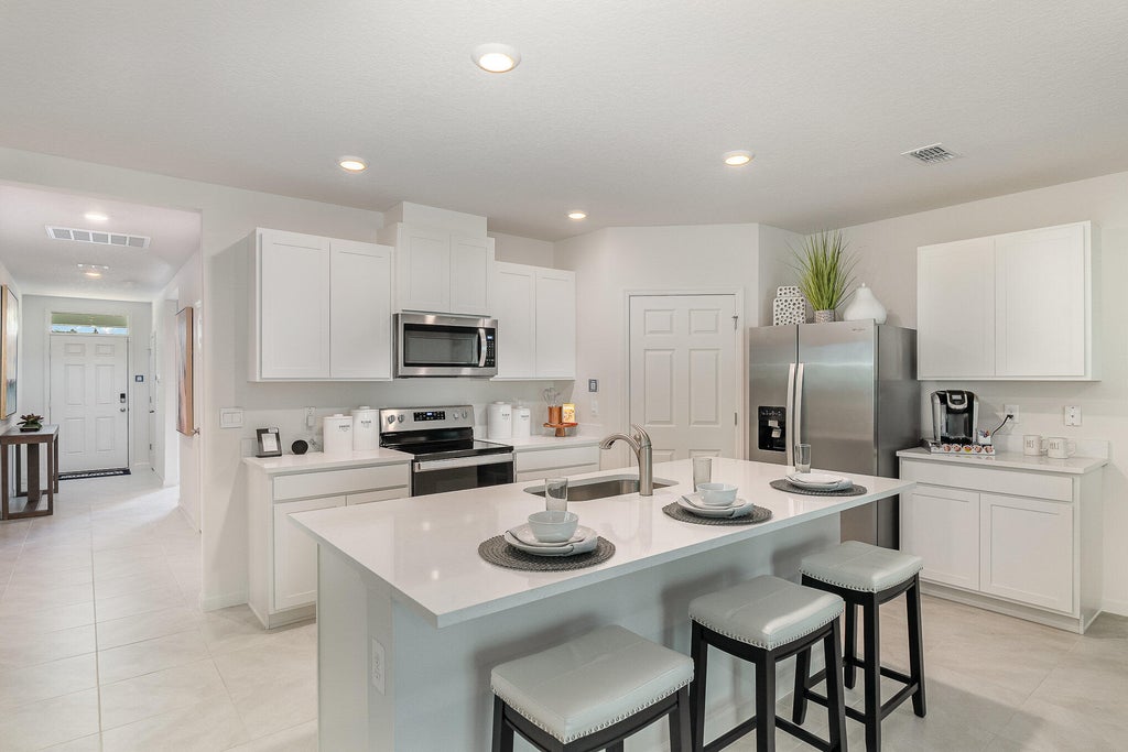 Photo of 2932 SW Port St Lucie Boulevard, Port Saint Lucie, FL 34953 (MLS # R11075559)