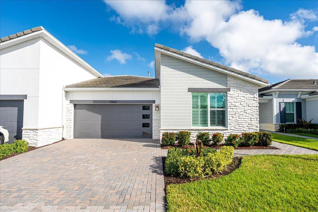 Photo of 11543 SW Viridian Boulevard, Port Saint Lucie, FL 34987 (MLS # R11132098)
