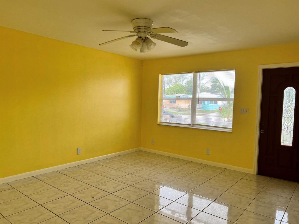 Photo of 5042 Eadie Place, West Palm Beach, FL 33407 (MLS # R11098100)