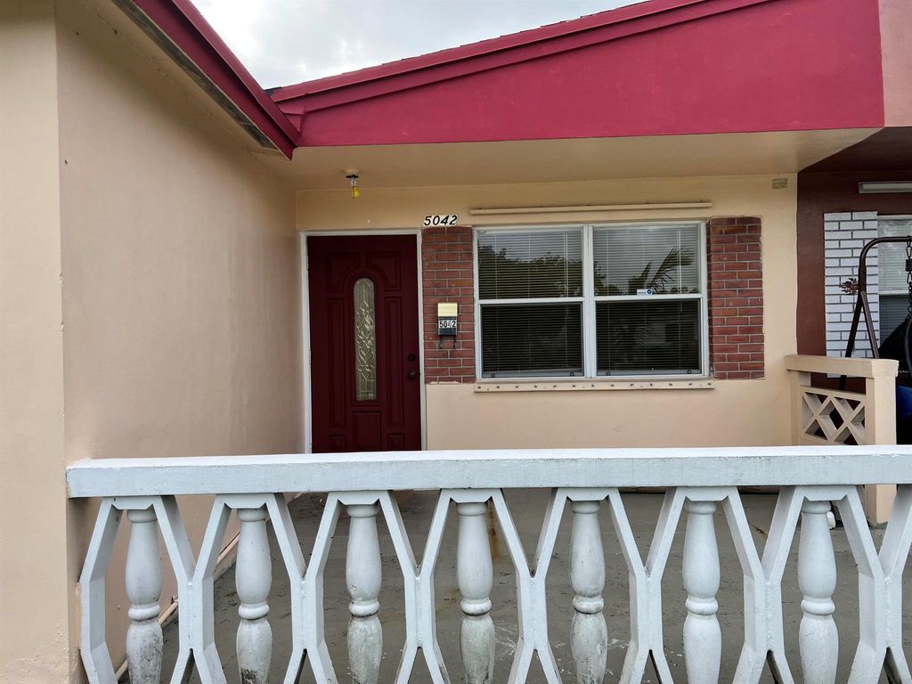 Photo of 5042 Eadie Place, West Palm Beach, FL 33407 (MLS # R11098100)