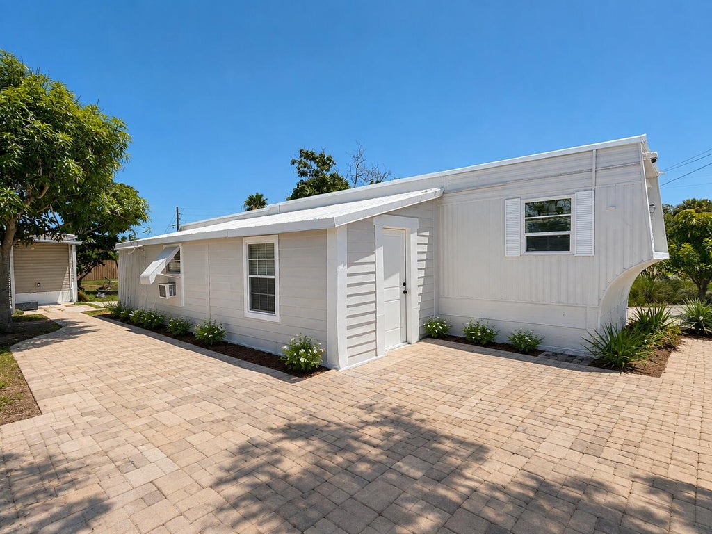 Photo of 11411 SE Federal Highway #55, Hobe Sound, FL 33455 (MLS # B26064009)