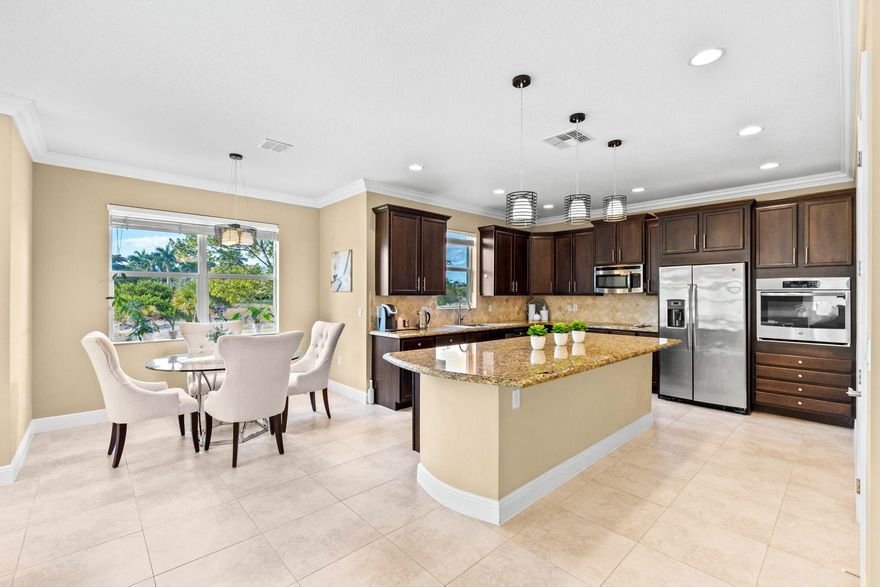 Live large, save big, and enjoy the view. Built in 2014 by Minto, this impressive 4-bedroom, 3-bath home offers over 3,100 sq ft of living space and a 3-car garage. This floorplan offers 1 bedroom and 1 full bathroom downstairs perfect for guest or in-laws. Enjoy tranquil lake views, abundant natural light, and crown molding throughout. Solar panels will be paid off at closing, keeping electric bills around $30 per month. Located in the desirable Portosol community with resort-style amenities including a heated pool, cabana, playground, splash park, sports courts, 24-hour gym, and billiard room—all just minutes from top dining and shopping.