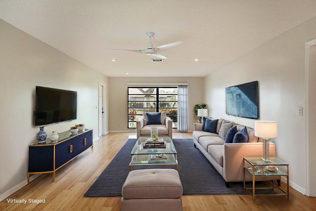 Photo of 10397 Equestrian Drive #A, Boynton Beach, FL 33436 (MLS # R11062294)