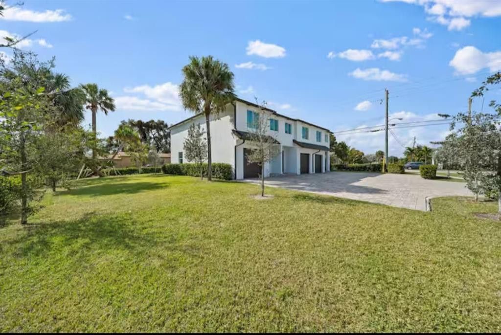 Photo of 1559 W 26th Court, Riviera Beach, FL 33404 (MLS # F10546034)