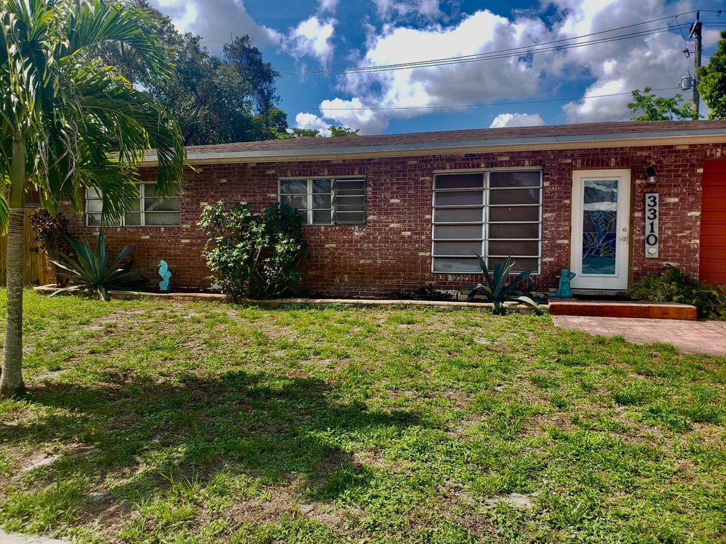Photo of 3310 SW 16th St, Fort Lauderdale, FL 33312 (MLS # B26000664)