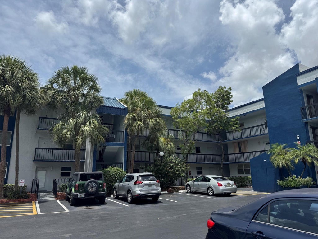 Photo of 3180 HOLIDAY SPRINGS Boulevard #5-309, Coral Springs, FL 33063 (MLS # B26060659)