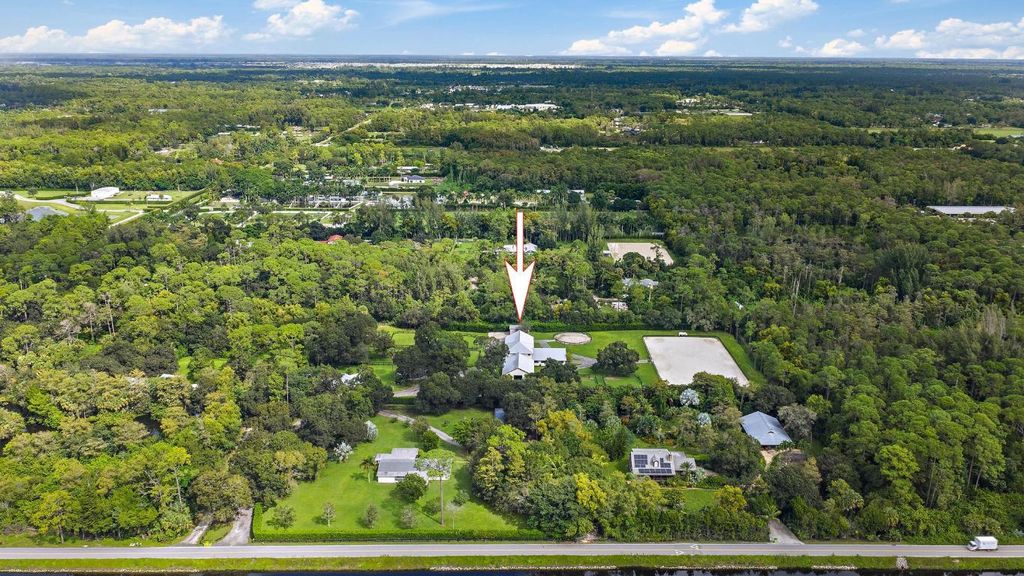 Photo of 14339 Collecting Canal Road, Loxahatchee Groves, FL 33470 (MLS # R11138008)