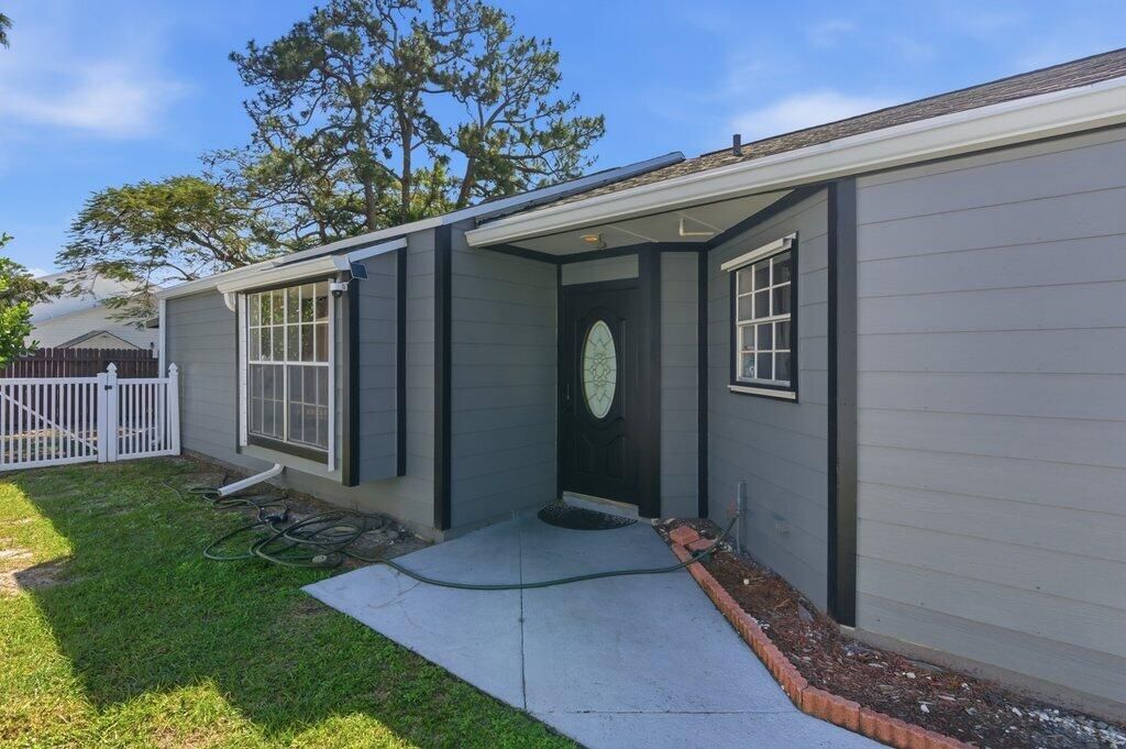 Photo of 1412 Corn Flower Lane, West Palm Beach, FL 33415 (MLS # R11167653)