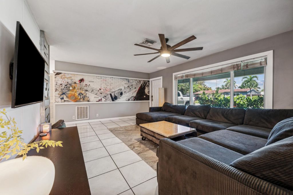 Photo of 12 SW 13th Court, Deerfield Beach, FL 33441 (MLS # R11023999)