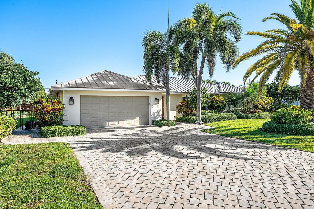 Photo of 1061 NW 3rd Street, Boca Raton, FL 33486 (MLS # B26006321)