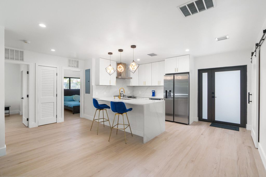 Photo of 303 De Carie Street, Delray Beach, FL 33444 (MLS # R11045100)