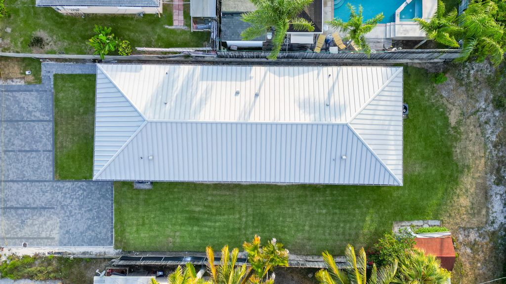 Photo of 303 De Carie Street, Delray Beach, FL 33444 (MLS # R11045100)
