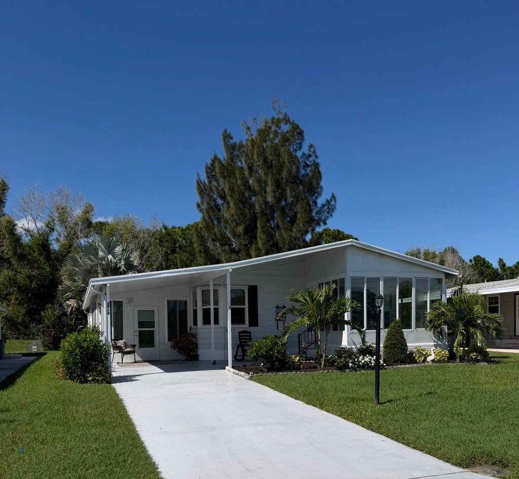 Photo of 2919 Fiddlewood Circle, Port Saint Lucie, FL 34952 (MLS # B26092168)