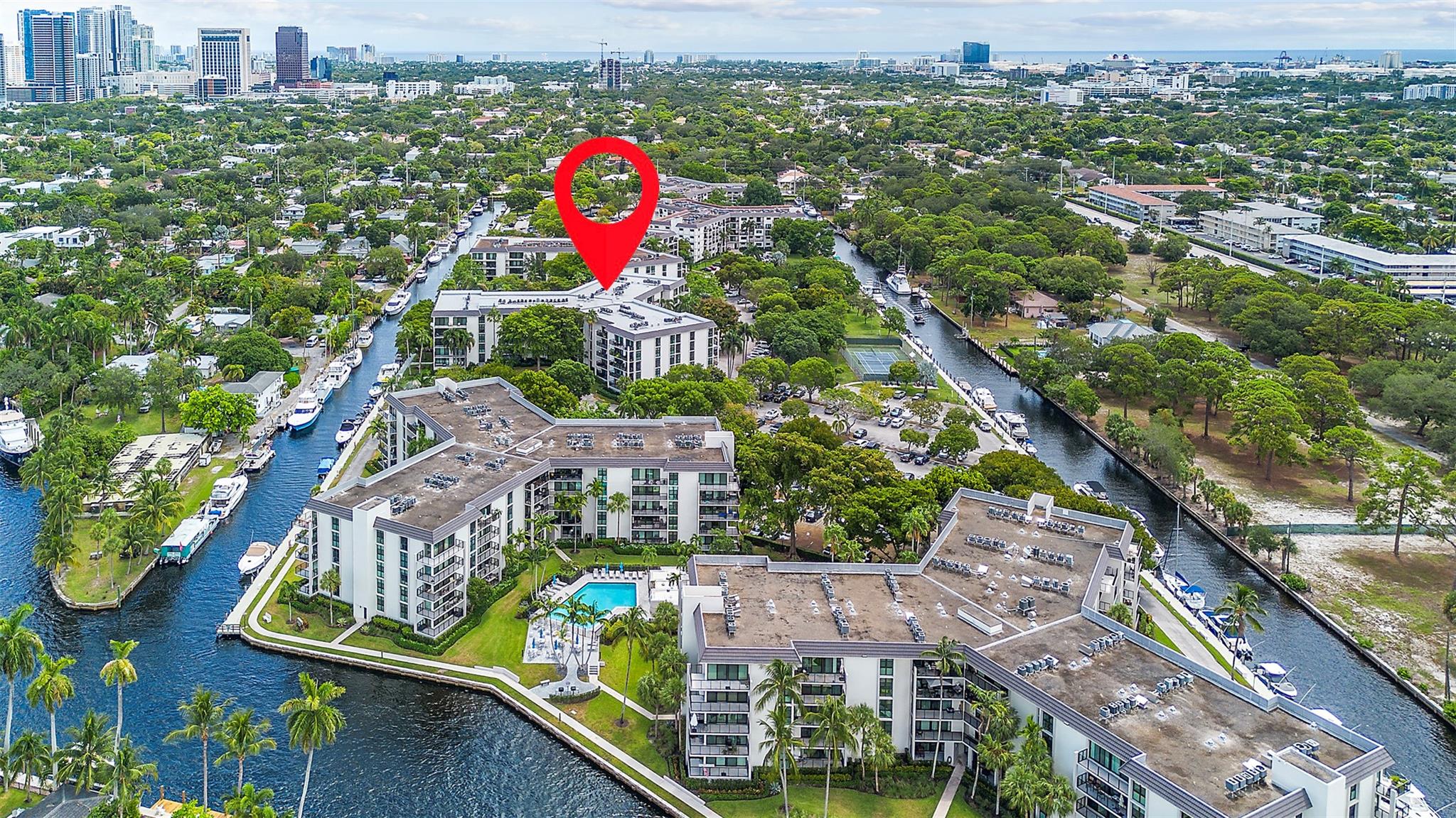 Welcome to this spacious 1/1.5, 1032 sf apartment with a great canal, garden, pool and city view! River Reach is a private island community, minutes from downtown FTLD, Las Olas and I-95! This 22 acre, boater's paradise features 3 heated pools, fitness room, BBQ grills, tennis and pickleball courts in a park-like setting with a guard gate for 24/7 security. Dockage is on an 'as available' basis, $4.10 per foot per month, boats up to 50' OAL. This apartment has new electric blinds, newer SS appliances and has a northeast facing balcony with beautiful views. The entire community has undergone a major overhaul with new balconies, impact windows, roofs, landscaping, paint, etc. Seller to pay existing assessment at closing, 2 pets, 20 lbs each ok. Come add your touches and make this your home.
